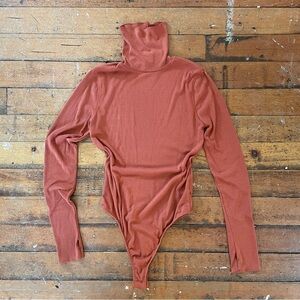 Free People orange ribbed turtleneck bodysuit size M